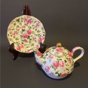 Chintz style single serve teapot and saucer. No cup.